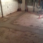 Trenching was done in the new Parish Office Center for new plumbing and new concrete is already in place.
