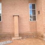The Marian Grotto, the retaining wall, and the landscaping have been removed to make room for the wall of glass! Don’t worry, the Blessed Mother has been carefully preserved and will be relocated to another location on the property.